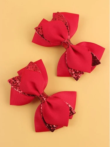 Barrettes cheveux arcs rouges