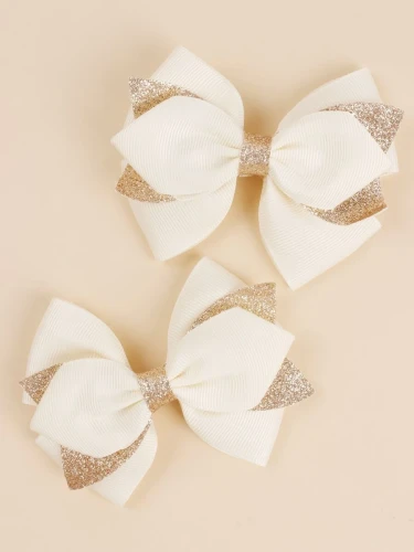 Barrettes cheveux arcs dorée