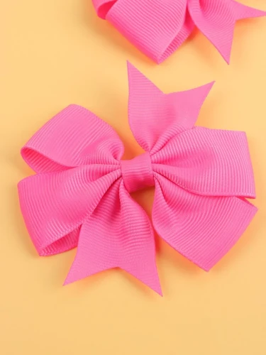Barrettes cheveux arcs rose foncé
