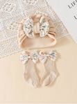 chaussettes bébé antidérapantes, turban bébé coton, ensemble bébé élégant, cadeau bébé spécial, accessoires bébé mode, tenue bébé quotidienne, chaussettes nœud floral, turban doux bébé, confort bébé, sécurité bébé, style bébé