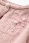 Boléro de cérémonie fille Ada rose, vue de dos, finition raffinée, boléro rose poudré