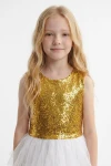 Robe Riva sans manches – haut doré à sequins et tulle blanc, vue de face cadrée à la taille