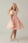 Robe Sia rose – pirouette en studio, jupe évasée qui tourne