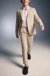 Costume garçon Liam beige – veste ouverte et pantalon, en mouvement de face