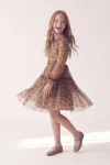 Robe Holly léopard – jupe évasée en tulle pendant une pirouette, vue de côté