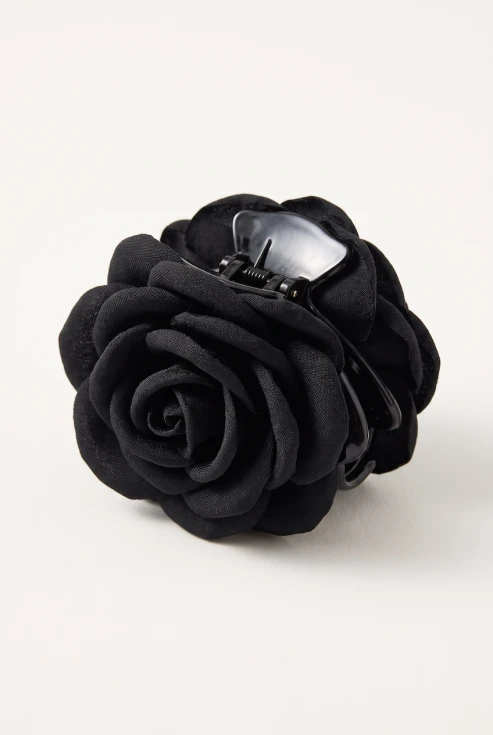 Pince crabe à fleur noire pour fille – rose en tissu, vue de trois quarts du dessus
